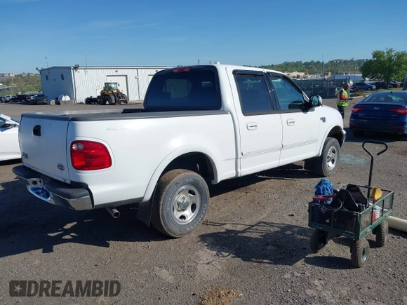 2003 Ford F-150 XLT with VIN 1FTRW08633KD11896, listed as a IAAI auction lot 42137360 with 118,654 mi miles. Bid and sale history available at carsss.com. Image 4.