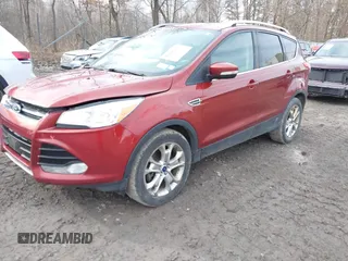 2015 Ford Escape Titanium with VIN 1FMCU9JX1FUA56091, listed as a IAAI auction lot 41947035 with 191,297 mi miles and . Bid and sale history available at DreamBid. Image 2.
