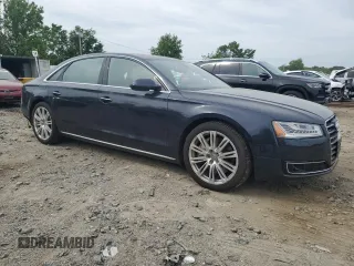 2016 Audi A8 3.0T with VIN WAU34AFD9GN009551, listed as a Copart auction lot 56460955 with 70,246 mi miles and Salvage title. Bid and sale history available at DreamBid. Image 4.
