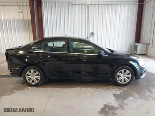 2017 Volkswagen Jetta 1.4T S with VIN 3VW167AJ5HM329706, listed as a IAAI auction lot 40801058 with 144,103 mi miles. Bid and sale history available at carsss.com. Image 14.