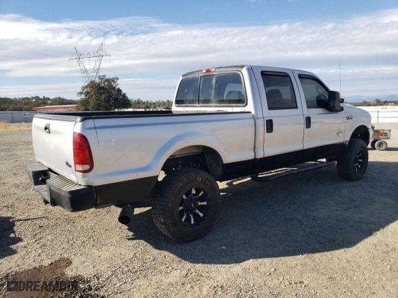 1999 Ford Super Duty F-350 SRW XL with VIN 1FTSW31F1XED24261, listed as a Copart auction lot 77626024 with NaN miles and Salvage Title. Bid and sale history available at carsss.com. Image 3.