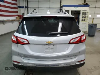 2020 Chevrolet Equinox Premier z VIN 2GNAXXEV3L6128099, wystawiony jako Copart lot #79041114 z przebiegiem 65 856 mil mil oraz Szkoda całkowita • Salvage title. Historia ofert i sprzedaży dostępna na DreamBid. Obrazek 6.