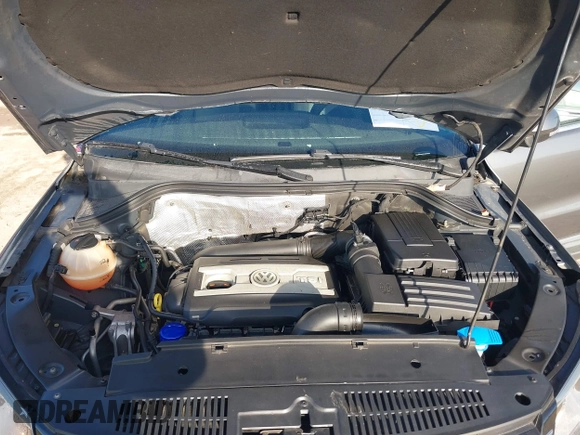 2012 Volkswagen Tiguan SEL with VIN WVGAV7AX2CW000962, listed as a IAAI auction lot 40815475 with 162,859 mi miles and . Bid and sale history available at DreamBid. Image 10.