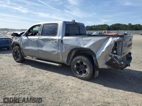 2020 Ram 1500 Rebel with VIN 1C6SRFLT0LN215917, listed as a Copart auction lot 58087705 with 69,683 mi miles and Salvage title. Bid and sale history available at DreamBid. Image 2.