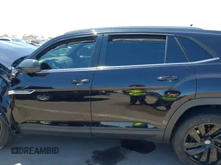 2022 Volkswagen Atlas SE z VIN 1V2KE2CA8NC220310, wystawiony jako IAAI lot #42218718 z przebiegiem 28 603 mil mil oraz . Historia ofert i sprzedaży dostępna na DreamBid. Obrazek 14.