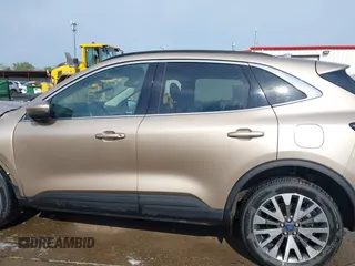 2020 Ford Escape Titanium z VIN 1FMCU9J92LUB48243, wystawiony jako IAAI lot #42143038 z przebiegiem 63 172 mil mil oraz . Historia ofert i sprzedaży dostępna na DreamBid. Obrazek 15.