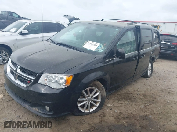 2018 Dodge Grand Caravan SXT with VIN 2C4RDGCGXJR283091, listed as a IAAI auction lot 41966553 with 102,309 mi miles and . Bid and sale history available at DreamBid. Image 2.