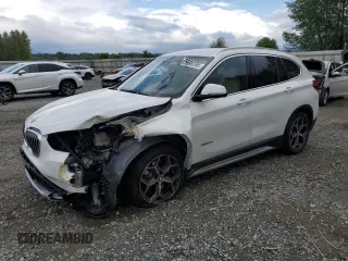 2016 BMW X1 xDrive28i z VIN WBXHT3C37GP882189, wystawiony jako Copart lot #56983985 z przebiegiem 45 700 mil mil oraz Szkoda całkowita • Salvage title. Historia ofert i sprzedaży dostępna na DreamBid. Obrazek 1.