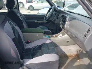 2002 Ford Explorer Sport Value с VIN 1FMYU60E22UB20590, выставлен на аукционе IAAI как лот 41534306 с пробегом 248 999 миль миль и . История ставок и продаж доступна на DreamBid. Изображение 5.