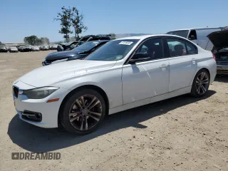 2012 BMW 3 Series 328i with VIN WBA3A5G51CNP18105, listed as a Copart auction lot 57418035 with 120,575 mi miles and Salvage title. Bid and sale history available at DreamBid. Image 1.