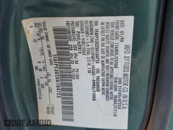 1999 Ford Taurus SE with VIN 1FAFP53U2XG184723, listed as a Copart auction lot 60787115 with 128,277 mi miles and Salvage title. Bid and sale history available at DreamBid. Image 12.