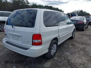 2005 Kia Sedona LX with VIN KNDUP132356708456, listed as a IAAI auction lot 41220936 with 172,960 mi miles. Bid and sale history available at carsss.com. Image 4.