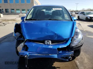 2007 Honda Fit Sport with VIN JHMGD38607S004236, listed as a Copart auction lot 52781415 with 313,559 mi miles and Salvage Title. Bid and sale history available at carsss.com. Image 5.