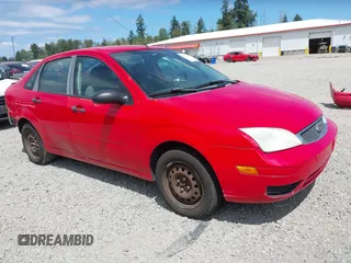 2007 Ford Focus S z VIN 1FAFP34NX7W272260, wystawiony jako IAAI lot #42529069 z przebiegiem 185 591 mil mil oraz . Historia ofert i sprzedaży dostępna na DreamBid. Obrazek 1.
