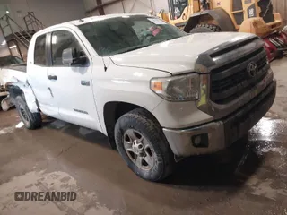 2014 Toyota Tundra 4WD Truck SR with VIN 5TFUY5F11EX393870, listed as a IAAI auction lot 41414461 with 120,837 mi miles. Bid and sale history available at carsss.com. Image 1.
