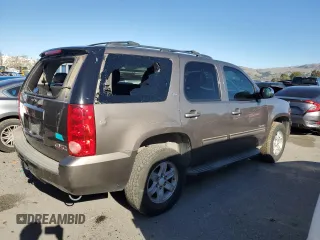 2012 GMC Yukon SLT with VIN 1GKS1CE03CR137258, listed as a Copart auction lot 87684815 with 253,348 mi miles and Salvage Title. Bid and sale history available at carsss.com. Image 3.