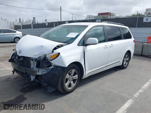 2013 Toyota Sienna LE AAS with VIN 5TDKK3DC2DS302465, listed as a IAAI auction lot 42241744 with 149,937 mi miles and . Bid and sale history available at DreamBid. Image 2.