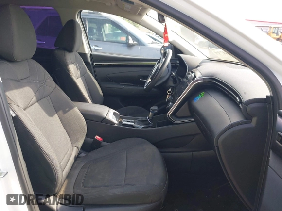 2022 Hyundai Tucson SE z VIN 5NMJACAE3NH012650, wystawiony jako IAAI lot #42137835 z przebiegiem 107 599 mil mil oraz . Historia ofert i sprzedaży dostępna na DreamBid. Obrazek 5.