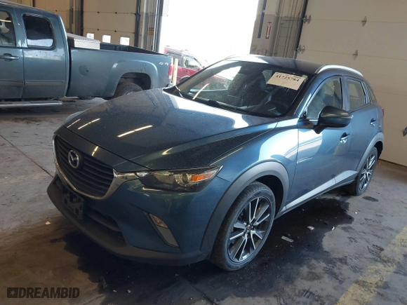 2018 Mazda CX-3 Touring with VIN JM1DKFC78J1323439, listed as a IAAI auction lot 41725784 with 134,055 mi miles. Bid and sale history available at carsss.com. Image 17.