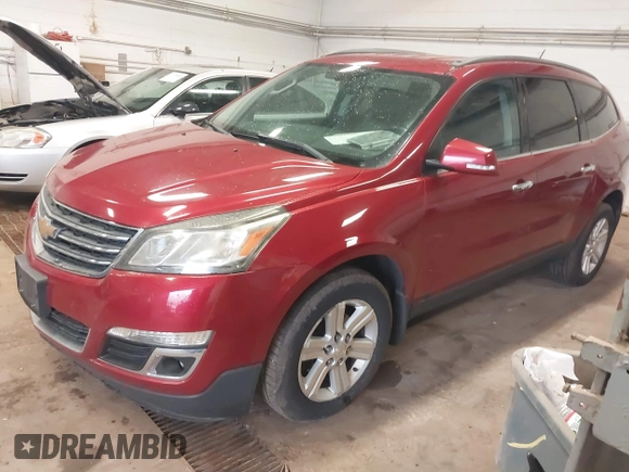 2013 Chevrolet Traverse LT with VIN 1GNKVJKDXDJ185830, listed as a IAAI auction lot 42142542 with 218,069 mi miles and . Bid and sale history available at DreamBid. Image 2.