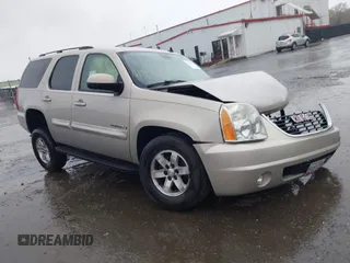 2007 GMC Yukon SLT z VIN 1GKFK13037J282696, wystawiony jako IAAI lot #41996538 z przebiegiem 143 607 mil mil oraz . Historia ofert i sprzedaży dostępna na DreamBid. Obrazek 1.