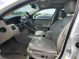 2012 Chevrolet Impala LTZ with VIN 2G1WC5E33C1131846, listed as a Copart auction lot 54431515 with 228,537 mi miles and Salvage Title. Bid and sale history available at DreamBid. Image 7.
