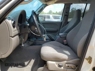 2004 Jeep Liberty Sport with VIN 1J4GL48K44W326612, listed as a Copart auction lot 52370945 with 116,215 mi miles and Salvage Title. Bid and sale history available at carsss.com. Image 7.