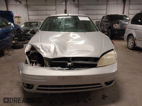 2007 Ford Focus S with VIN 1FAFP37NX7W330802, listed as a IAAI auction lot 41663895 with 147,015 mi miles and . Bid and sale history available at carsss.com. Image 13.