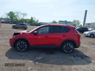 2016 Mazda CX-5 Grand Touring with VIN JM3KE4DY9G0850583, listed as a IAAI auction lot 42075545 with 92,789 mi miles and . Bid and sale history available at carsss.com. Image 14.