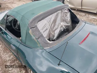 1999 BMW Z3 z VIN 4USCH3336XLF40956, wystawiony jako IAAI lot #41940092 z przebiegiem 198 612 mil mil oraz . Historia ofert i sprzedaży dostępna na DreamBid. Obrazek 13.
