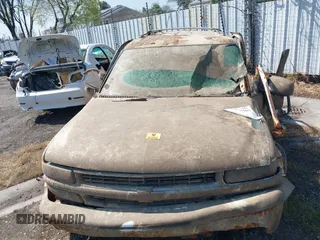 2003 Chevrolet Suburban LT z VIN 3GNEC16Z23G120835, wystawiony jako IAAI lot #41885363 z przebiegiem Nie podano mil oraz . Historia ofert i sprzedaży dostępna na DreamBid. Obrazek 12.