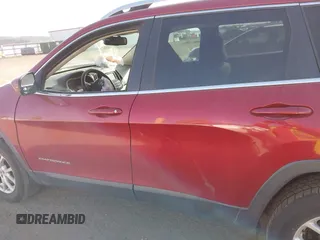 2016 Jeep Cherokee Latitude with VIN 1C4PJMCS8GW250318, listed as a IAAI auction lot 42126241 with 105,028 mi miles. Bid and sale history available at carsss.com. Image 15.