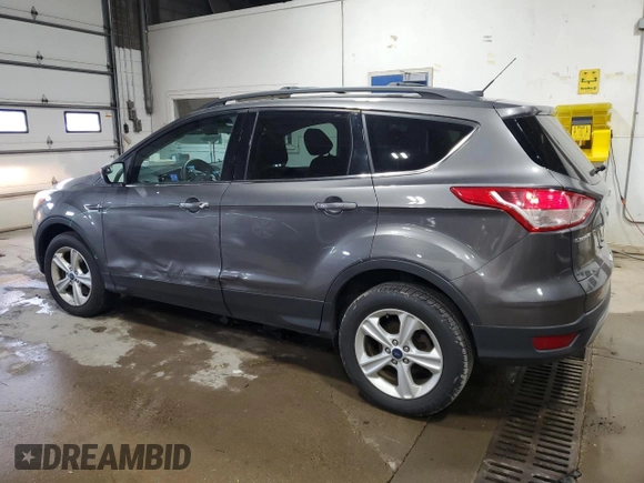2013 Ford Escape SE with VIN 1FMCU9G96DUB33138, listed as a Copart auction lot 61851665 with 148,742 mi miles and Salvage title. Bid and sale history available at DreamBid. Image 2.