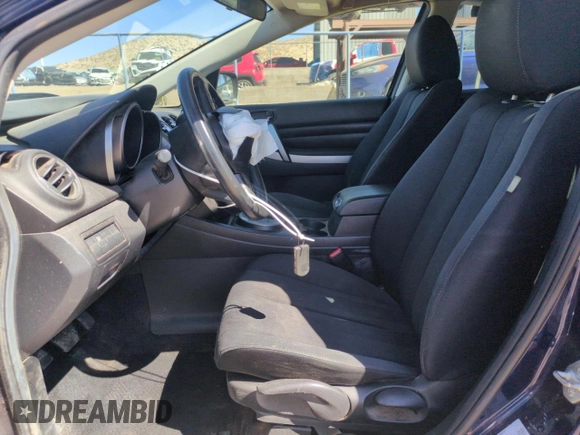2011 Mazda CX-7 i SV with VIN JM3ER2A51B0354735, listed as a Copart auction lot 50057095 with 140,764 mi miles and Salvage Title. Bid and sale history available at carsss.com. Image 7.