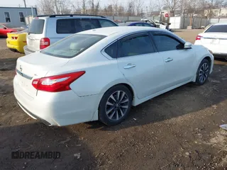 2016 Nissan Altima SR with VIN 1N4AL3AP8GC169495, listed as a IAAI auction lot 41792151 with 131,918 mi miles and . Bid and sale history available at carsss.com. Image 4.
