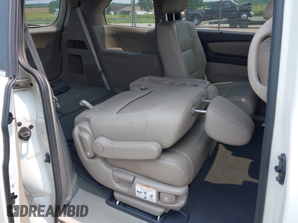 2014 Honda Odyssey EX-L with VIN 5FNRL5H62EB109573, listed as a IAAI auction lot 42387637 with 208,061 mi miles and . Bid and sale history available at DreamBid. Image 8.