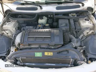 2006 MINI Hardtop S with VIN WMWRE33596TJ37959, listed as a IAAI auction lot 42635457 with 124,440 mi miles and . Bid and sale history available at DreamBid. Image 10.