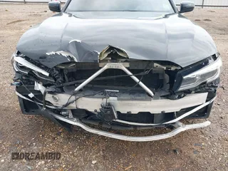 2019 BMW 3 Series 330i with VIN WBA5R1C51KAE82094, listed as a IAAI auction lot 39040815 with 66,344 mi miles and . Bid and sale history available at DreamBid. Image 19.