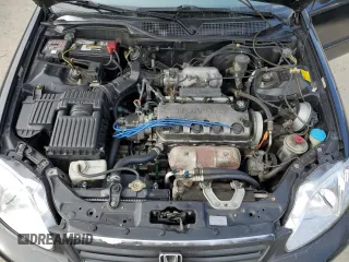 1999 Honda Civic EX z VIN 2HGEJ8641XH531176, wystawiony jako Copart lot #50145445 z przebiegiem 138 366 mil mil oraz Szkoda całkowita • Salvage title. Historia ofert i sprzedaży dostępna na DreamBid. Obrazek 11.