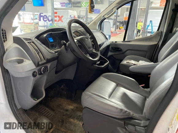 2016 Ford Transit Cargo with VIN 1FTYE1YM4GKB52041, listed as a IAAI auction lot 42284153 with 177,079 mi miles and . Bid and sale history available at DreamBid. Image 13.