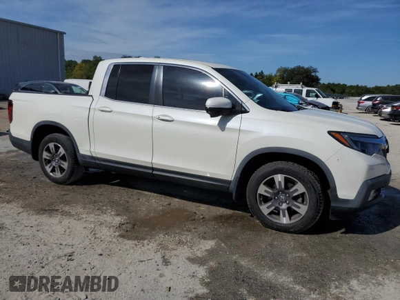 2019 Honda Ridgeline RTL-T with VIN 5FPYK2F62KB002624, listed as a Copart auction lot 50142765 with 62,947 mi miles and Salvage title. Bid and sale history available at DreamBid. Image 4.