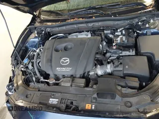 2016 Mazda 3 i Touring with VIN JM1BM1L71G1343674, listed as a IAAI auction lot 41630218 with 70,052 mi miles and . Bid and sale history available at DreamBid. Image 10.