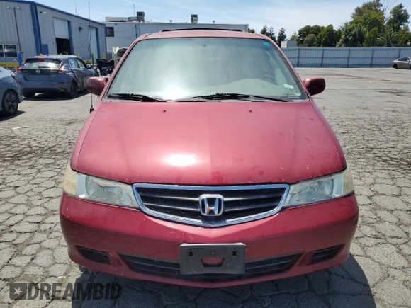 2004 Honda Odyssey EX-L with VIN 5FNRL18014B031578, listed as a Copart auction lot 56938795 with 241,085 mi miles and Salvage title. Bid and sale history available at DreamBid. Image 5.