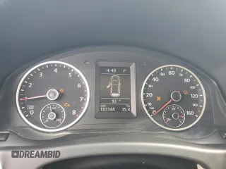 2012 Volkswagen Tiguan SE with VIN WVGAV7AX1CW557300, listed as a Copart auction lot 58975585 with 183,344 mi miles and Salvage title. Bid and sale history available at DreamBid. Image 9.