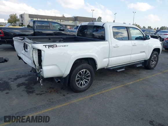 2020 Toyota Tacoma SR5 with VIN 3TMBZ5DN7LM026596, listed as a IAAI auction lot 40705410 with 123,489 mi miles and . Bid and sale history available at DreamBid. Image 4.