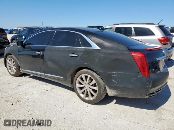 2014 Cadillac XTS Luxury z VIN 2G61M5S39E9302853, wystawiony jako Copart lot #57712215 z przebiegiem 180 886 mil mil oraz Czysty tytuł • Clean title. Historia ofert i sprzedaży dostępna na DreamBid. Obrazek 2.
