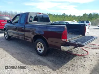 2000 Ford F-150 XL with VIN 1FTZX1725YNB34291, listed as a IAAI auction lot 41831745 with 207,119 mi miles. Bid and sale history available at carsss.com. Image 3.