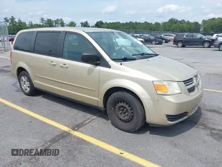 2010 Dodge Grand Caravan SE z VIN 2D4RN4DE3AR334975, wystawiony jako IAAI lot #42458181 z przebiegiem 219 702 mil mil oraz . Historia ofert i sprzedaży dostępna na DreamBid. Obrazek 1.