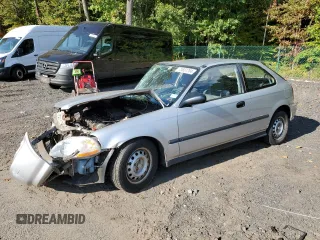 1998 Honda Civic CX with VIN 2HGEJ6427WH121499, listed as a Copart auction lot 73657704 with 101,999 mi miles and Salvage Title. Bid and sale history available at DreamBid. Image 1.