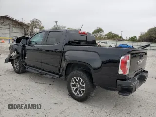 2022 GMC Canyon 4WD AT4 w/Leather with VIN 1GTG6FEN2N1294071, listed as a Copart auction lot 84652954 with 53,076 mi miles and Salvage Title. Bid and sale history available at carsss.com. Image 2.